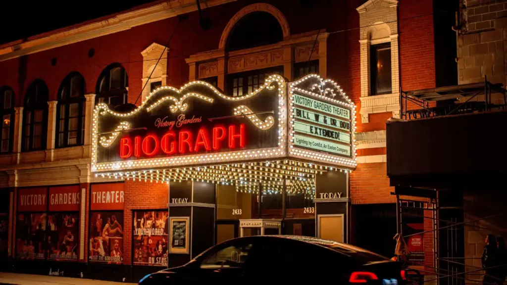 The illuminated Biograph Theater marquee shines brightly at night in Chicago, Illinois